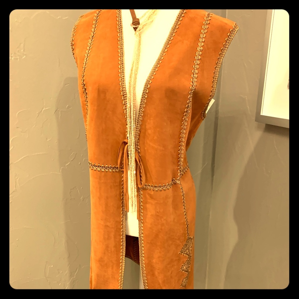 Gorgeous  and Brand New long vest with tags.